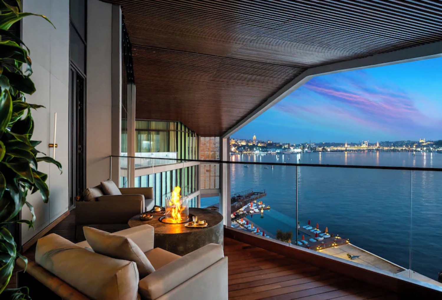 Residence balcony lounge at dusk overlooking the Golden Horn